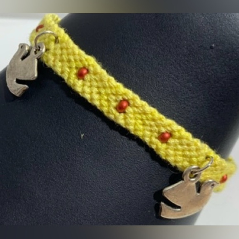 Hand crafted beaded and silver bird charms macrame bracelet